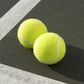 ___8940168___2018___10___5___9___two-tennis-balls-on-tennis-court-elevated-view-royalty-free-image-200443252-001-1538667208