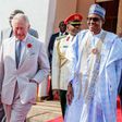 Prince Charles (M) and his wife Camilla, the Duchess of Cornwall (L) and President Buhari (R)