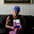 Yamileth Marcano shows a picture of her brother who was stabbed to death for his smartphone, becoming one of the thousands murdered in crisis-hit Venezuela