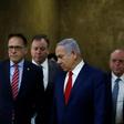 Israeli Prime Minister Benjamin Netanyahu (2nd-R) arrives for the weekly cabinet meeting at the Prime Minister's office in Jerusalem on December 23, 2018
