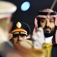 Saudi Crown Prince Mohammed bin Salman is seen behind a military band upon his arrival at Algiers International Airport, southeast of the capital Algiers on December 2, 2018
