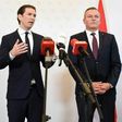 Austrian Chancellor Sebastian Kurz (L) told a press conference that the retired colonel is suspected of working with Russian intelligence from the 1990s until 2018