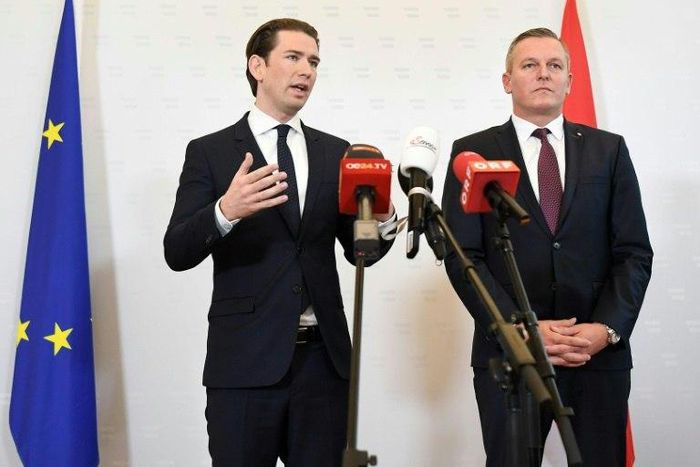 Austrian Chancellor Sebastian Kurz (L) told a press conference that the retired colonel is suspected of working with Russian intelligence from the 1990s until 2018