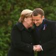 Germany is taking a softly-softly approach to French President Emmanuel Macron's easing of the budget strings to cope with protests, with Chancellor Angela Merkel (right) focussing on stability in Europe, analysts say