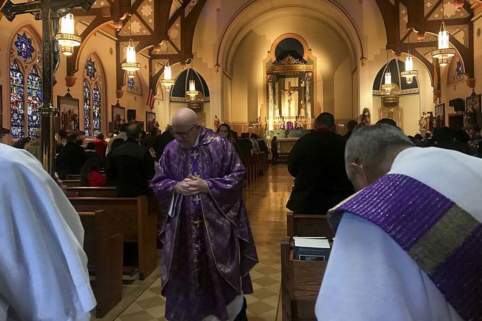 Priest Who Was Still Saying Mass After Abuse Settlements Is Suspended