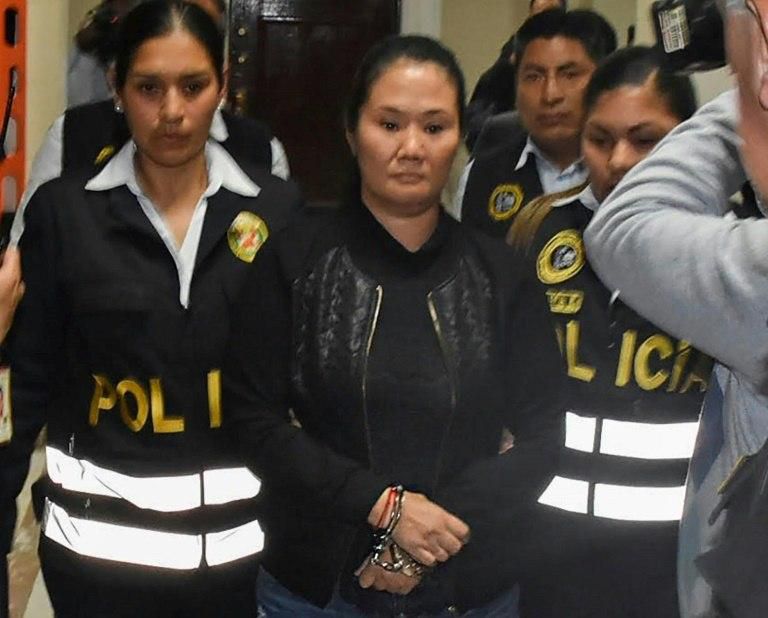 Opposition leader Keiko Fujimori being conducted handcuffed to jail after an October 31, 2018 court hearing in Lima