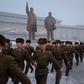 Korean People's Army soldiers leave after bowing before the statues of late North Korean leaders Kim Il Sung and Kim Jong Il during National Memorial Day in Pyongyang