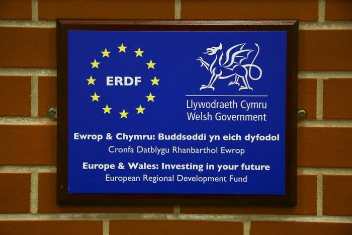 The 12 stars of the European Union displayed next to the Welsh dragon at Swansea University's new campus, which the EU helped finance