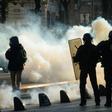 Clouds of tear gas fill the street during a "yellow vest" demonstration in the western French city of Nantes