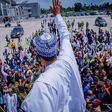 President Muhammadu Buhari waves at a crowd of supporters in Port Harcourt, Rivers State on October 25, 2018