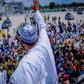 President Muhammadu Buhari waves at a crowd of supporters in Port Harcourt, Rivers State on October 25, 2018