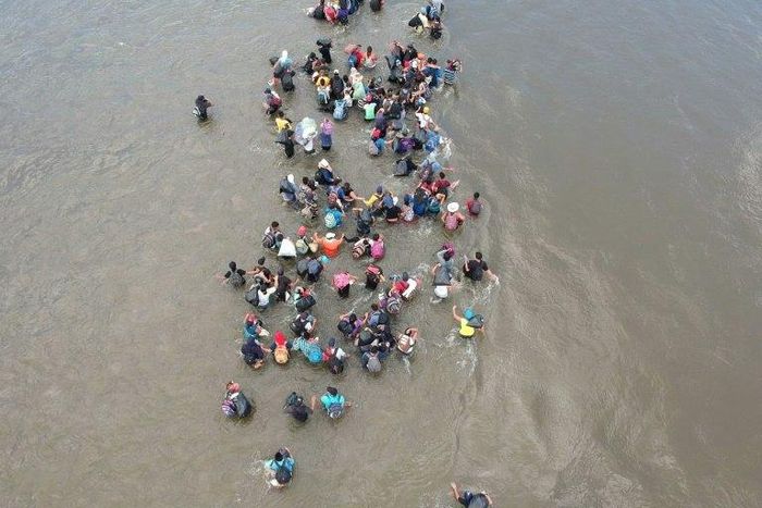 Caravans of thousands of Central Americans have made their way to the US-Mexico border in a challenge to US President Donald Trump