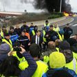 An official talks to yellow vest protesters during last week's action