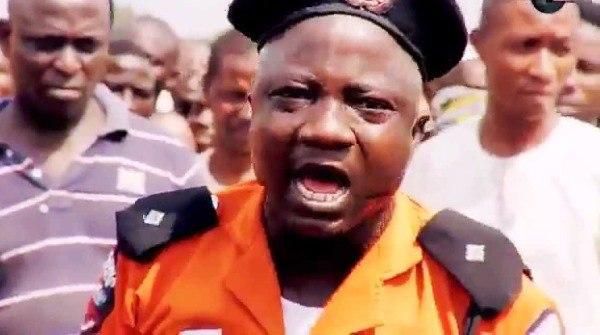 Sanyeri playing the role of a traffic warden