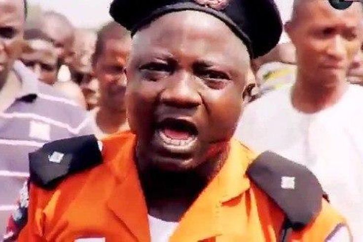 Sanyeri playing the role of a traffic warden