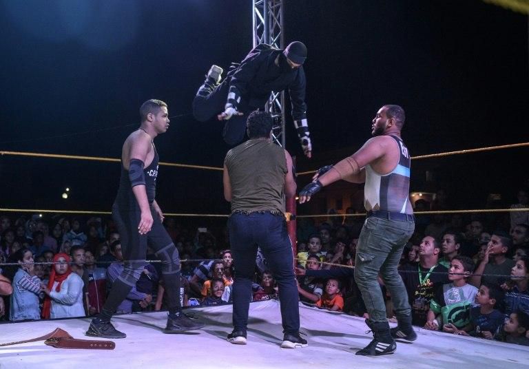 Egyptian wrestlers like "Ninja" (C, top) and "Tiger" (R) are starting to get noticed and have a following
