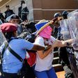 Police arrest a demonstrator in the Nicaraguan capital Managua