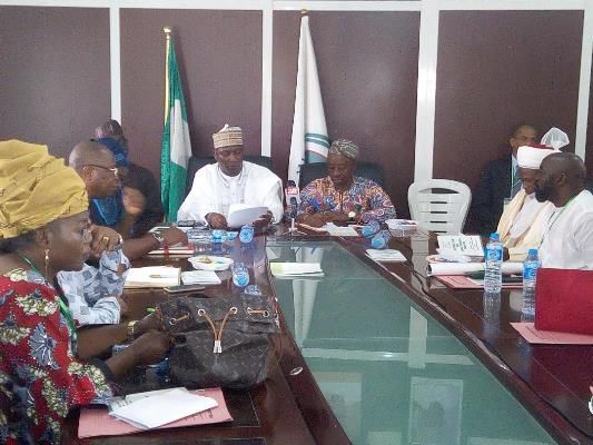 Adedayo Thomas,Executive Director, NFVCB, the Board Chairman,Tunde Kelani (R), other members of the Board at a meeting in Abuja, on Friday, March 2, 2018.