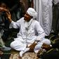 Sadiq al-Mahdi, Sudan's ex-prime minister and leader of the opposition Umma Party, is greeted by supporters in a mosque in the capital Khartoum's twin city of Omdurman on December 19, 2018 after his return from exile