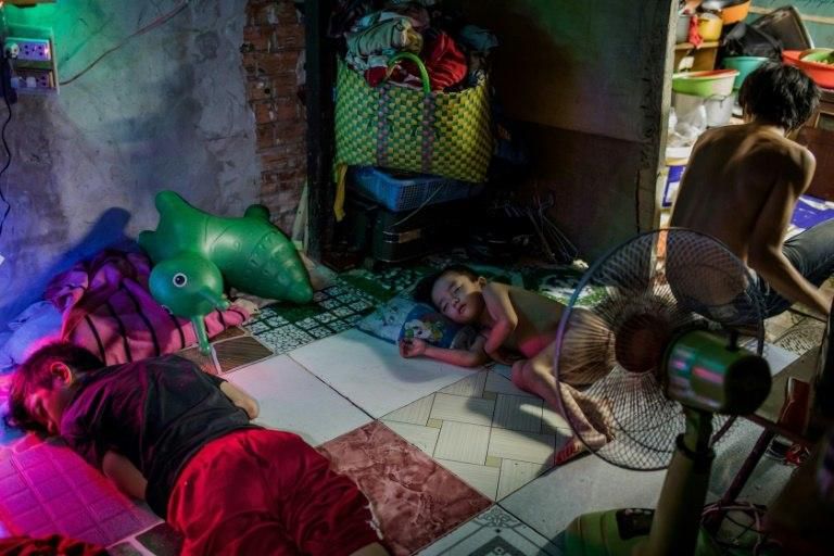 Those living along the Xuyen Tam canal are some of the city's poorest