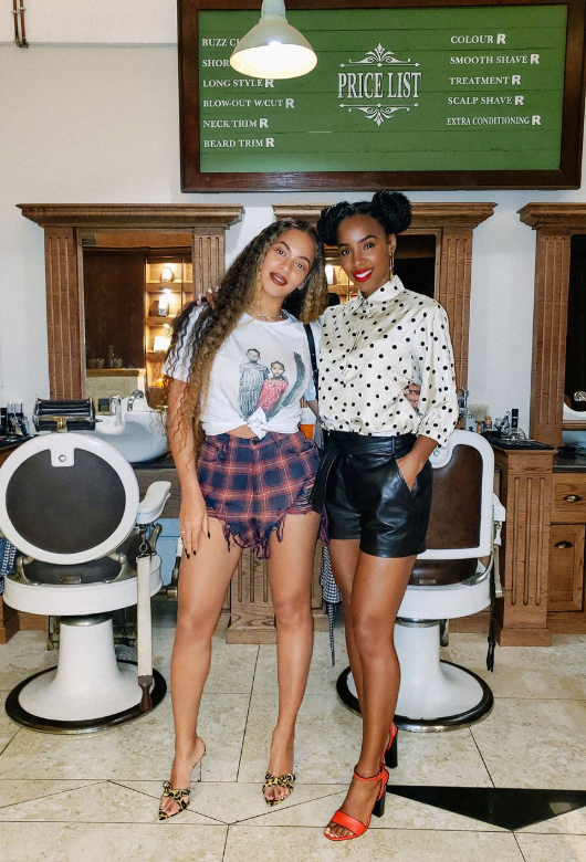 Beyonce and Kelly pose in matching shorts
