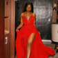Jackie Aina celebrates Christmas in Lagos in a Michael Costello red dress