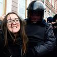 Police arrest a protester in Saint Petersburg on Sunday