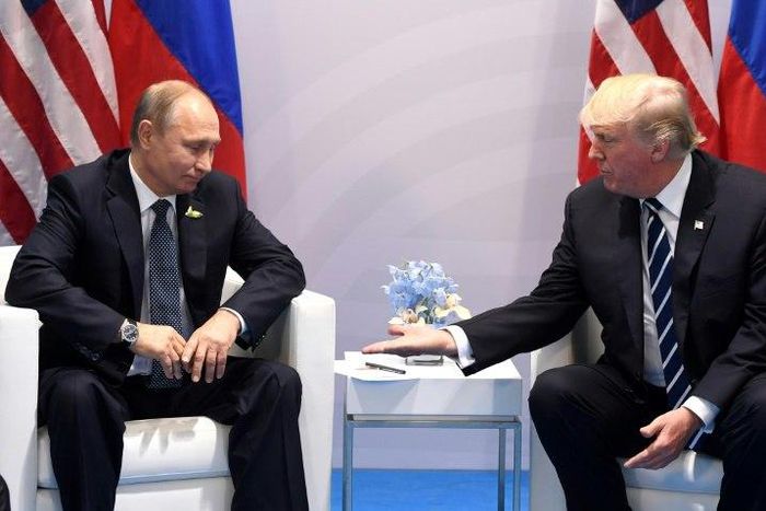 US President Donald Trump (R) and Russia's President Vladimir Putin, pictured during the G20 Summit in Hamburg, Germany, in July 2017, are to also attend a G20 gathering that begins November 26 in Argentina