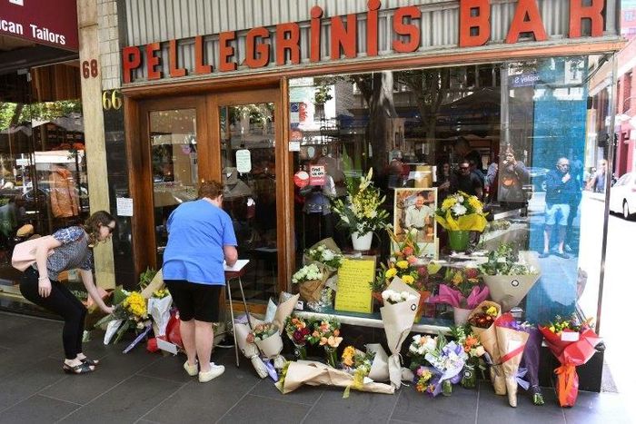 Crowds gathered at the famous cafe to lay flowers in remembrance of its proprietor Sisto Malaspina, who was stabbed to death in a terror attack