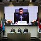 UAE Energy Minister Suhail al-Mazrouei, seen here addressing the December 7 meeting at which OPEC and some non-OPEC producers agreed to cut oil output, says they will meet again in April to review the impact