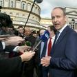 Fianna Fail leader Micheal Martin (C, pictured March 2016) said that his party is "determined that the political chaos we see in London will not be allowed to spread to Ireland"
