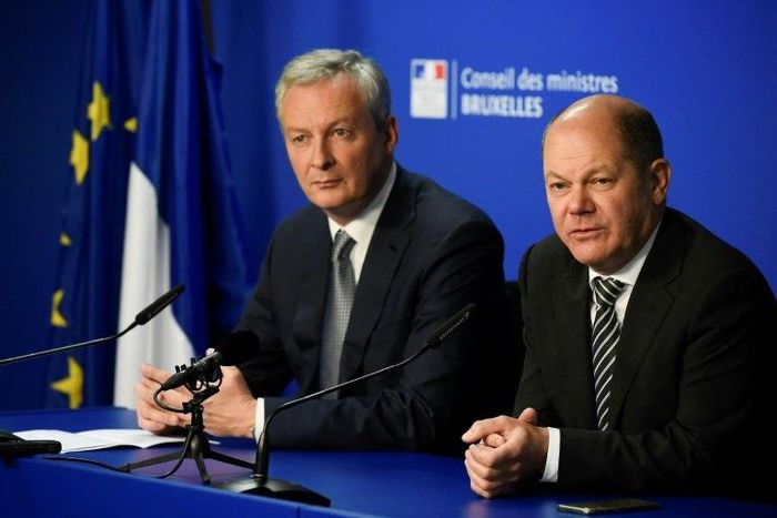 German Finance Minister Olaf Scholz (R) and his French counterpart Bruno Le Maire will present their tax proposal on Monday