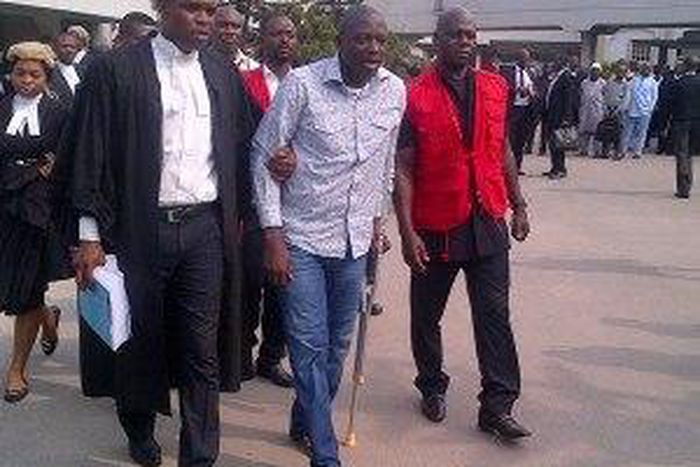 Patrick Akpobolokemi on crutches