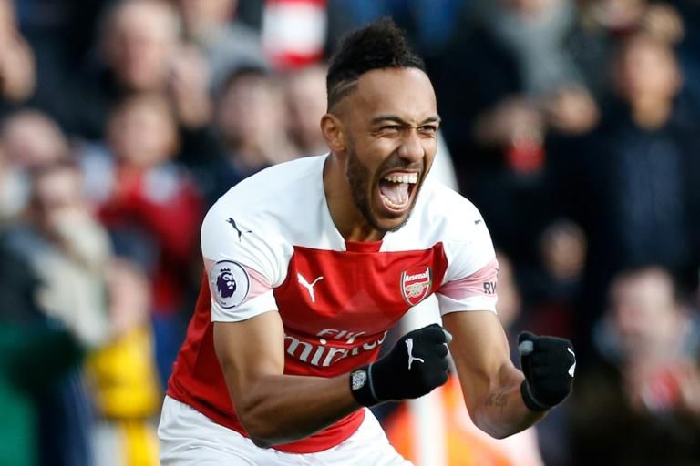 Top of the charts: Pierre-Emerick Aubameyang is the Premier League's top scorer on 12 after scoring twice against Burnley