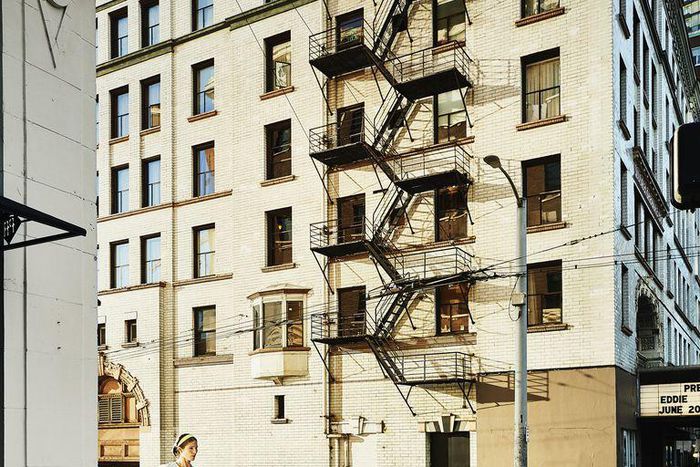 ___9171861___2018___12___5___23___pregnant-woman-running-on-city-sidewalk-high-res-stock-photography-862881822-1543618162