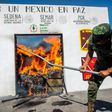 The mexican military burns tons of marijuana, heroin, cocaine and methamphetamine seized from traffickers at a base in Monterrey, on April 8, 2014