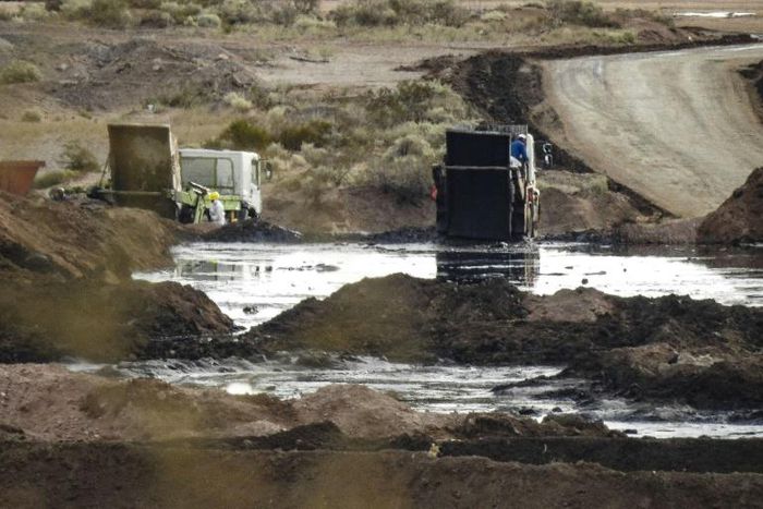 This handout photo distributed by Greenpeace on December 17, 2018 shows an illegal waste dump, where toxic fracking waste chemicals are poured in Vaca Muerta, Neuquen province, Argentina