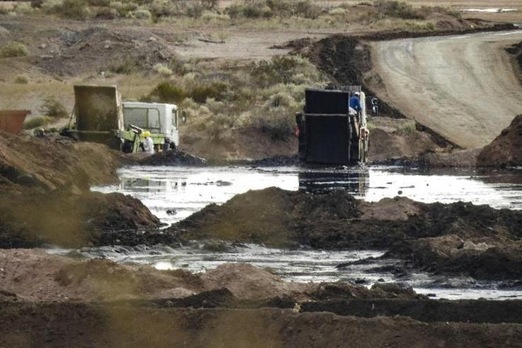 This handout photo distributed by Greenpeace on December 17, 2018 shows an illegal waste dump, where toxic fracking waste chemicals are poured in Vaca Muerta, Neuquen province, Argentina