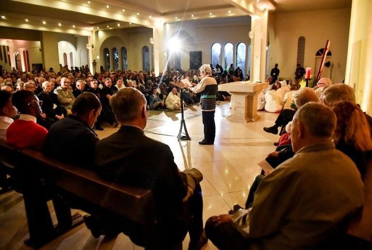 Sister Anne-Marie (C), a nun who was wounded during Algeria's civil war in the 1990s, gives her testimony during a spiritual vigil at the cathedral in the northwestern city of Oran
