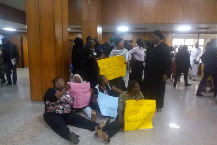 National Assembly workers protest unpaid salaries and allowances as plenary resumes.