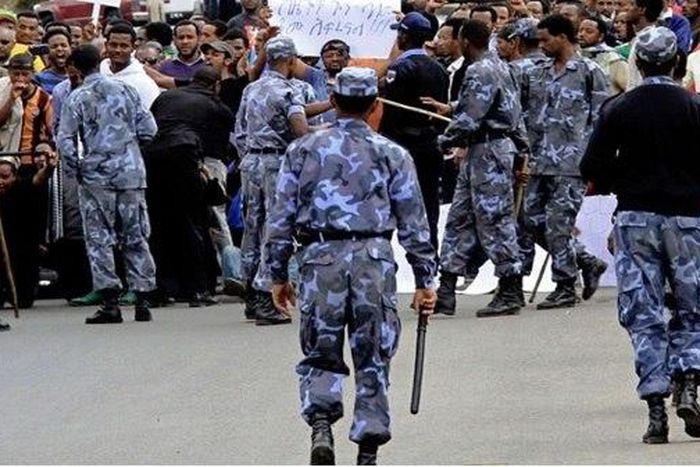 Ethiopian Pollice Officers already had their hands full, dousing ethnic tensions. The last thing they expected was facing each other