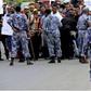 Ethiopian Pollice Officers already had their hands full, dousing ethnic tensions. The last thing they expected was facing each other