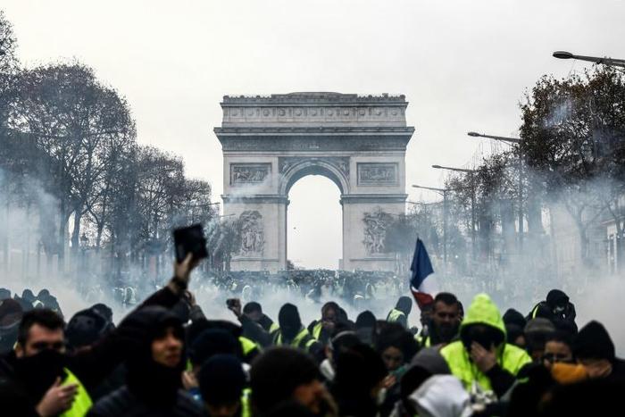 Yellow-vest protesters on the Champs-Elysees in Paris on Saturday