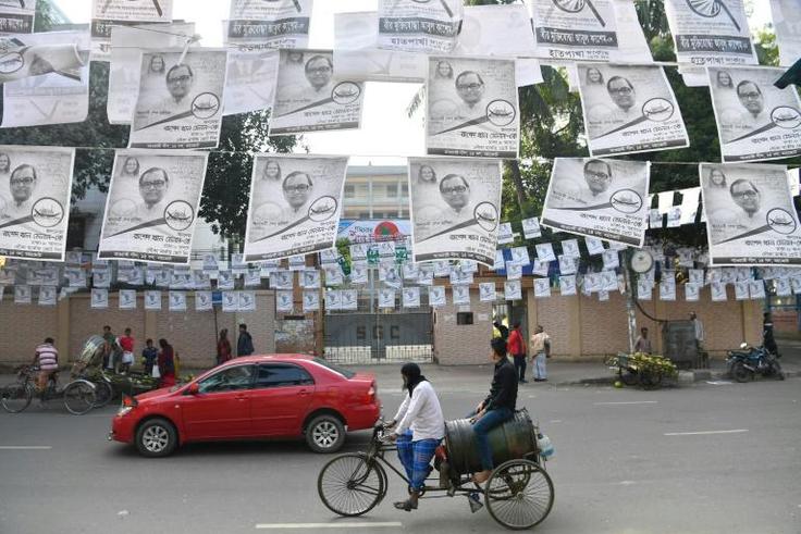 A street adorned with election posters in Dhaka on December 28, 2018, ahead of the Dec 30 general election