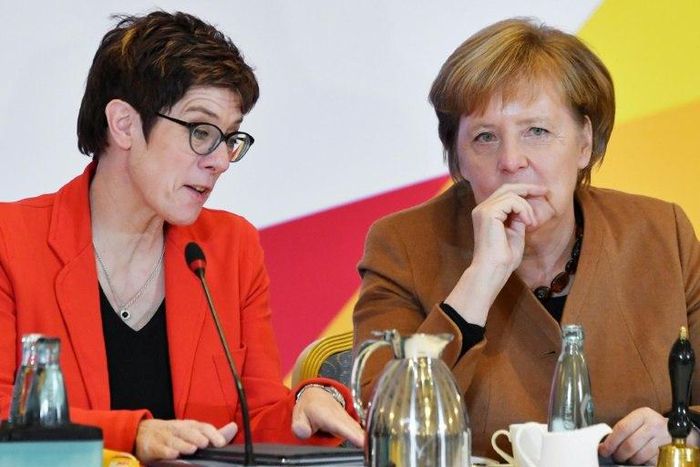 CDU Secretary General Annegret Kramp-Karrenbauer (L) is widely seen as Angela Merkel's anointed crown princess, although Merkel herself has shied away from publicly naming her preferred successor