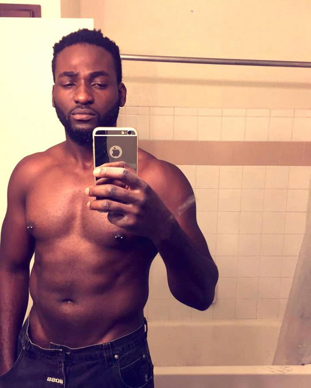 Gbenro Ajibade made an exhibition of his body which has just been pierced with a nipple ring.
