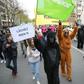 Activists from Greenpeace, one of the NGOs who accuse France of not respecting its short-term climate objectives, take part in a march for climate in Paris earlier this month