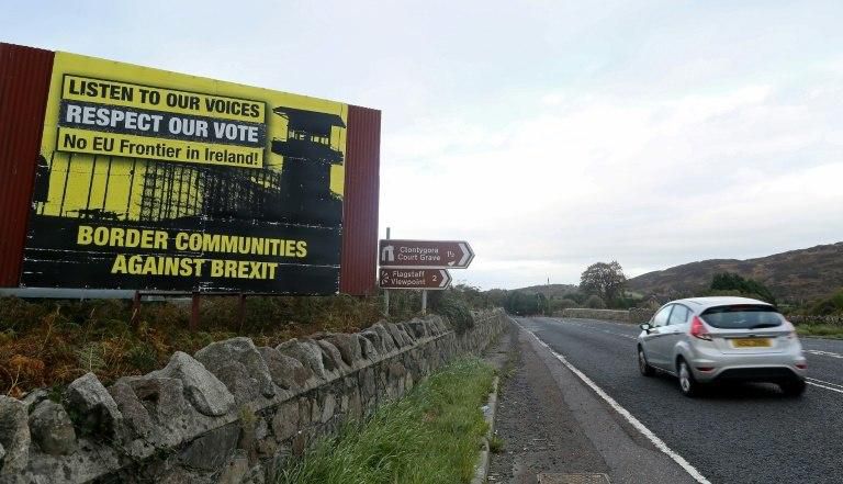 A billboard protesting against a post-Brexit border between Northern Ireland and Ireland, which has become a main sticking point in Britain-EU talks