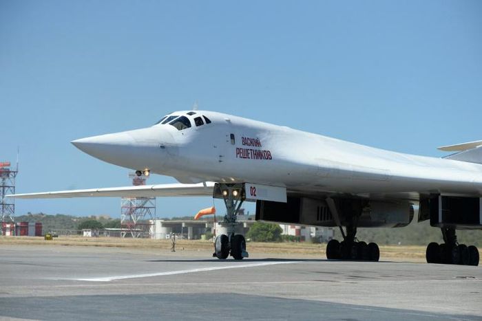 A Russian Tupolev Tu-160 strategic long-range heavy supersonic bomber aircraft is pictured upon landing at Maiquetia International Airport, just north of Caracas, on December 10, 2018