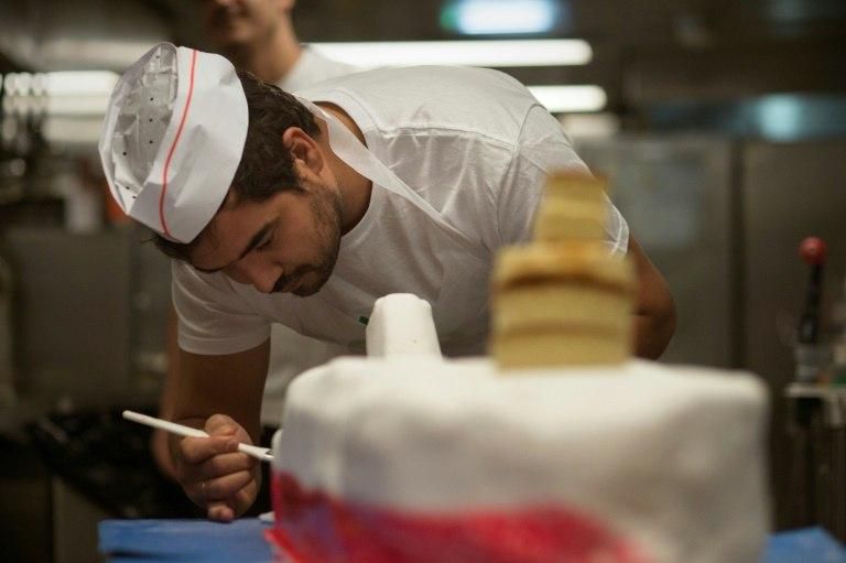 Workers do four weeks on the ship and then four weeks off and culinary treats help boost camaraderie